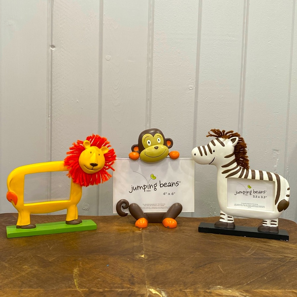 Set of 3 Safari Picture Frames. One Holds 4”x6” photo.  2 hold 2.5”x 2.5”  Cute!